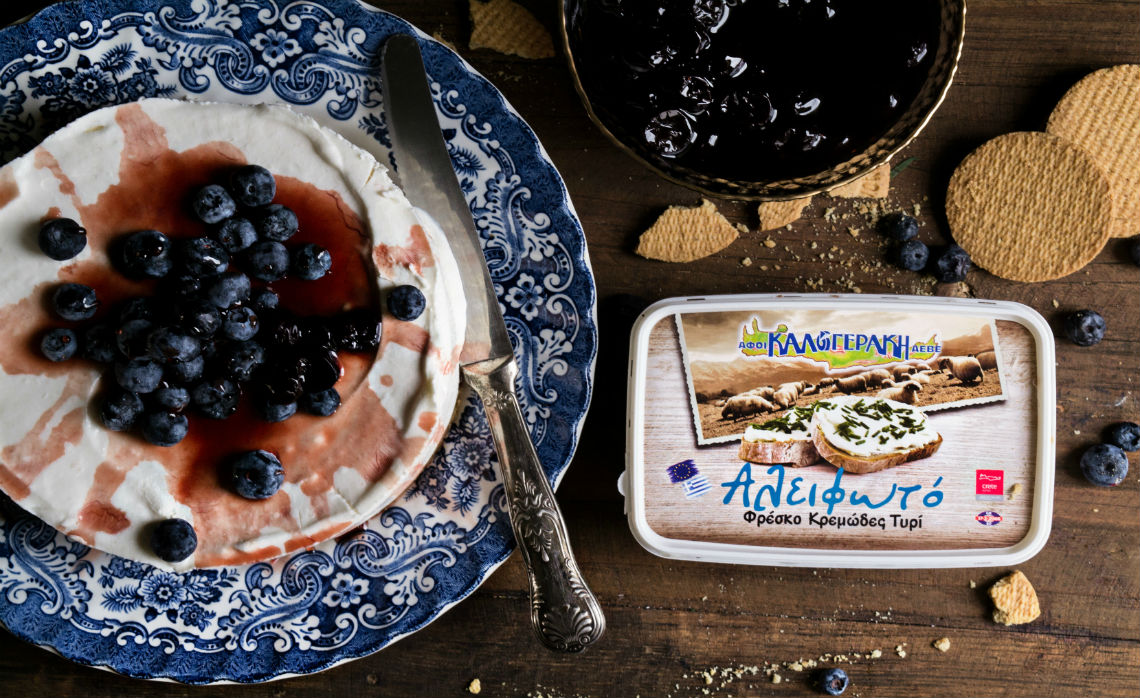 Cheesecake with "Alifoto" fresh creamy cheese, cherry and blueberries